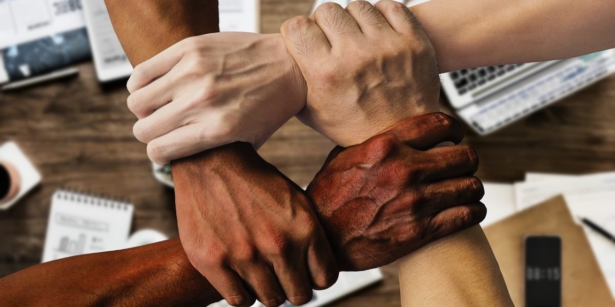 A dynamic startup team collaborating, embodying the innovative spirit of high-growth companies disrupting various verticals with practical AI solutions.