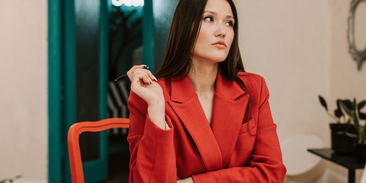 A person reflecting on how technological advancements, particularly AI, might influence their career path and daily life.