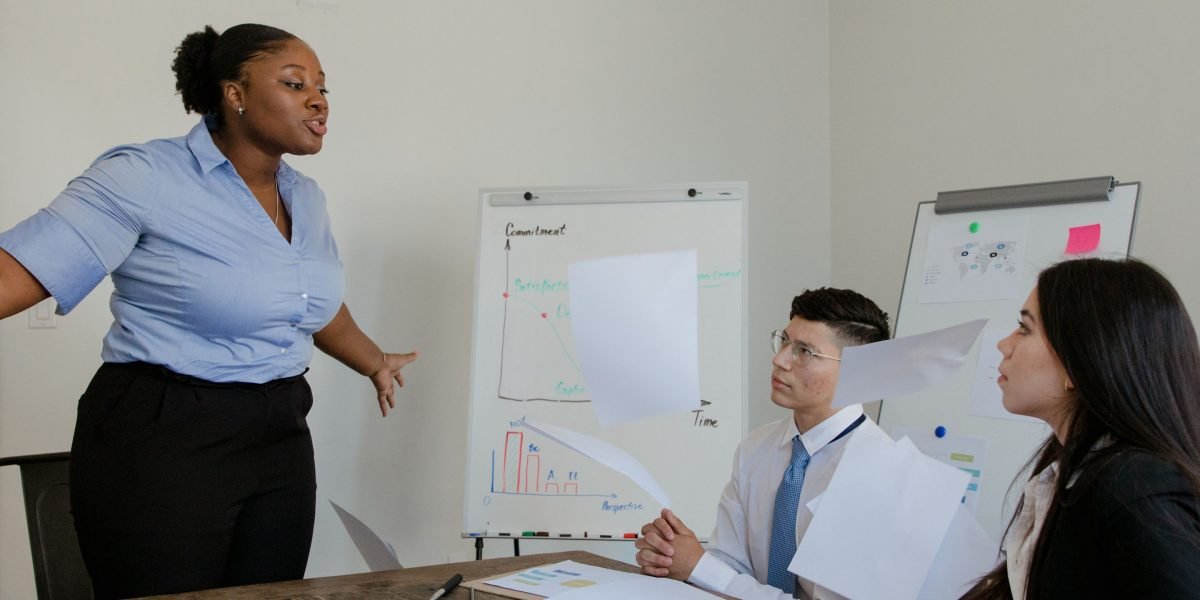 A business leader thoughtfully reviewing documents, symbolizing the strategic decision-making process for AI investments.