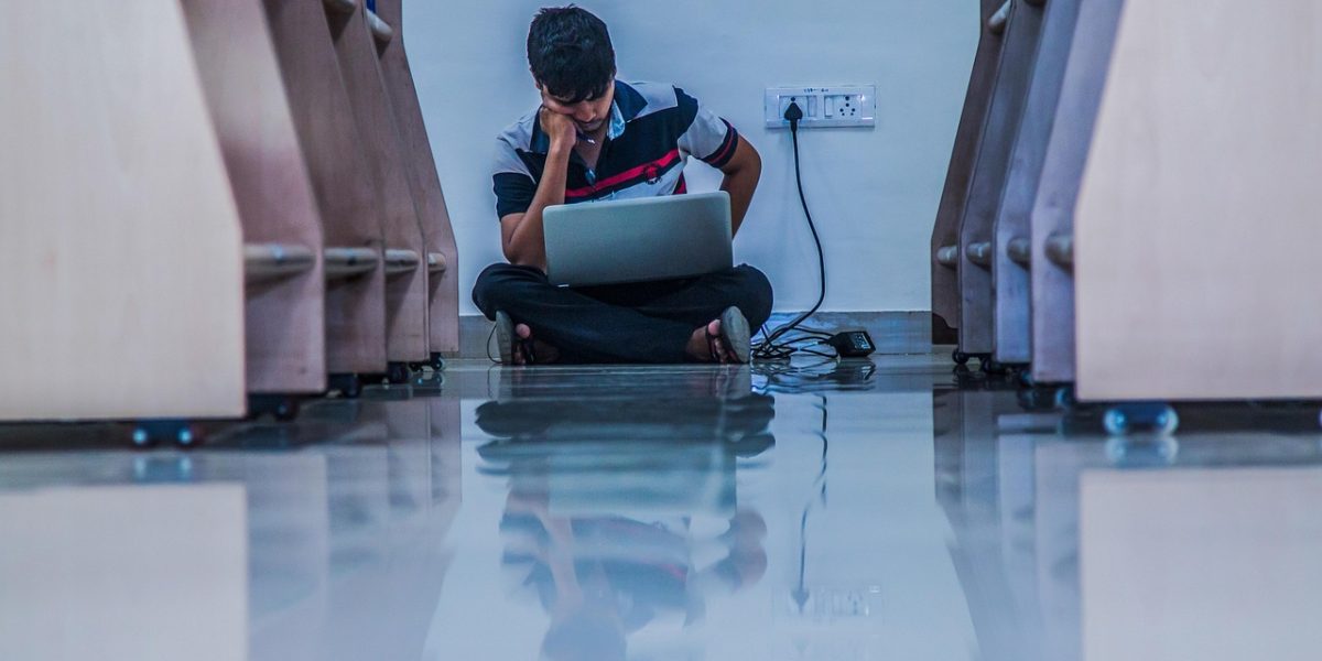 A person deeply focused on learning or understanding intricate concepts related to AI and its underlying technologies.