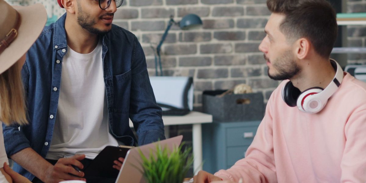 A team working together on a project, showcasing effective human-AI collaboration.