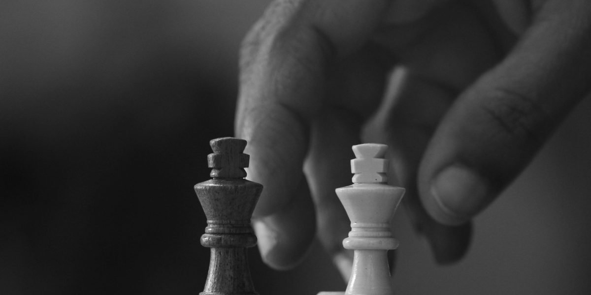 A person evaluating options, symbolizing the selection of appropriate AI tools for business needs.