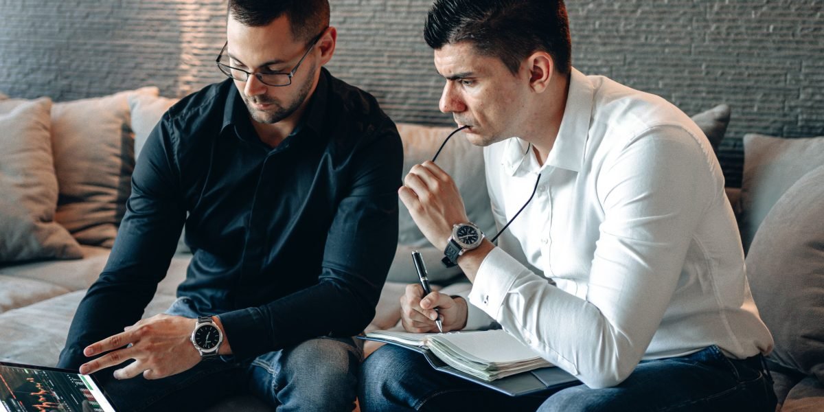 Professionals engaged in a thoughtful discussion, embodying the process of making smart, actionable decisions in private equity.