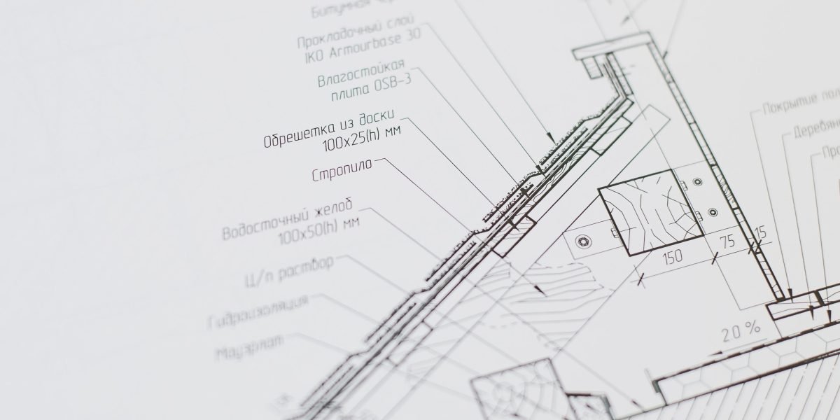Engineers discussing technical specifications and making trade-offs for device performance.