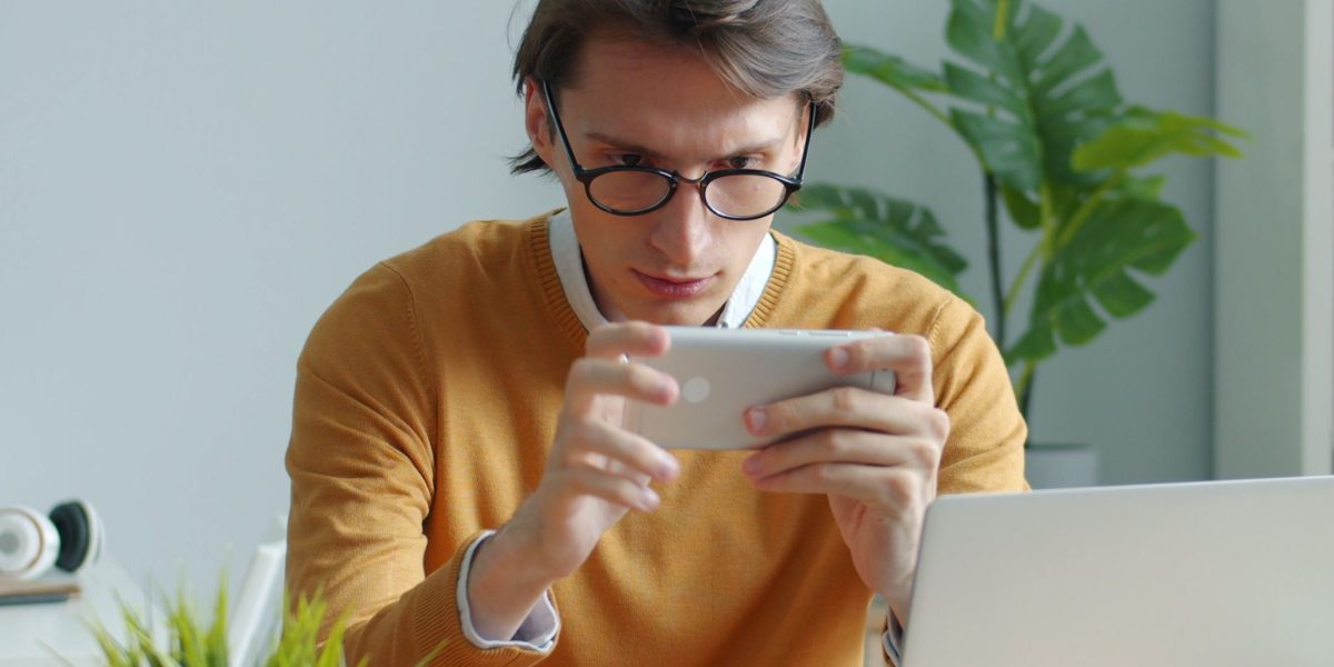 An individual effectively utilizing digital tools and automation to streamline information management.