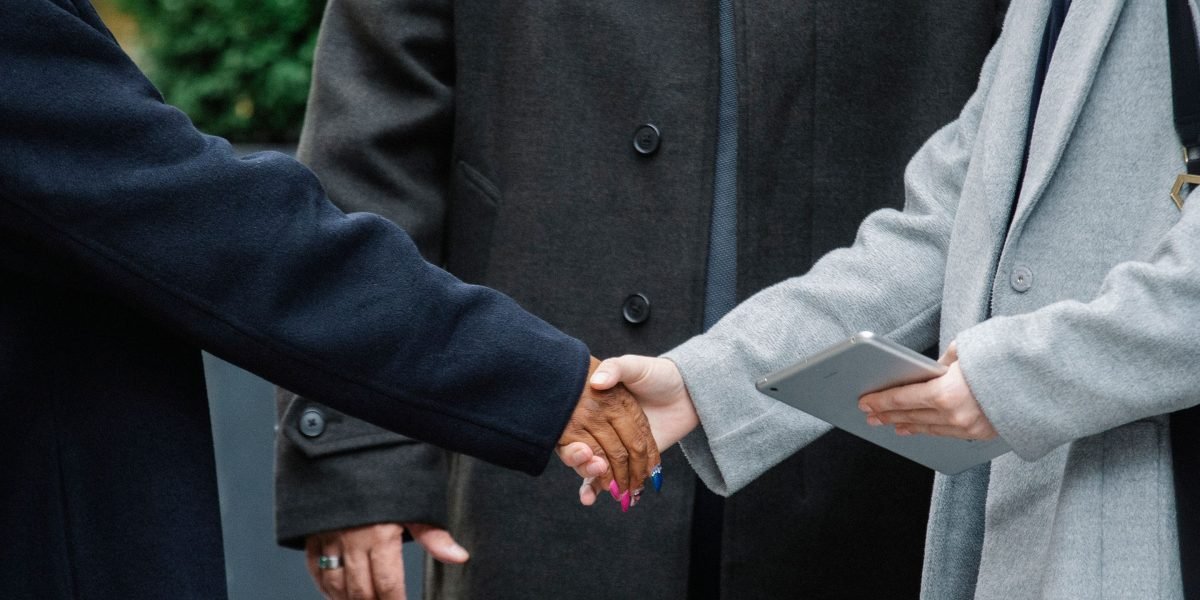 Symbolize the successful closing of a deal and the start of a valuable partnership.